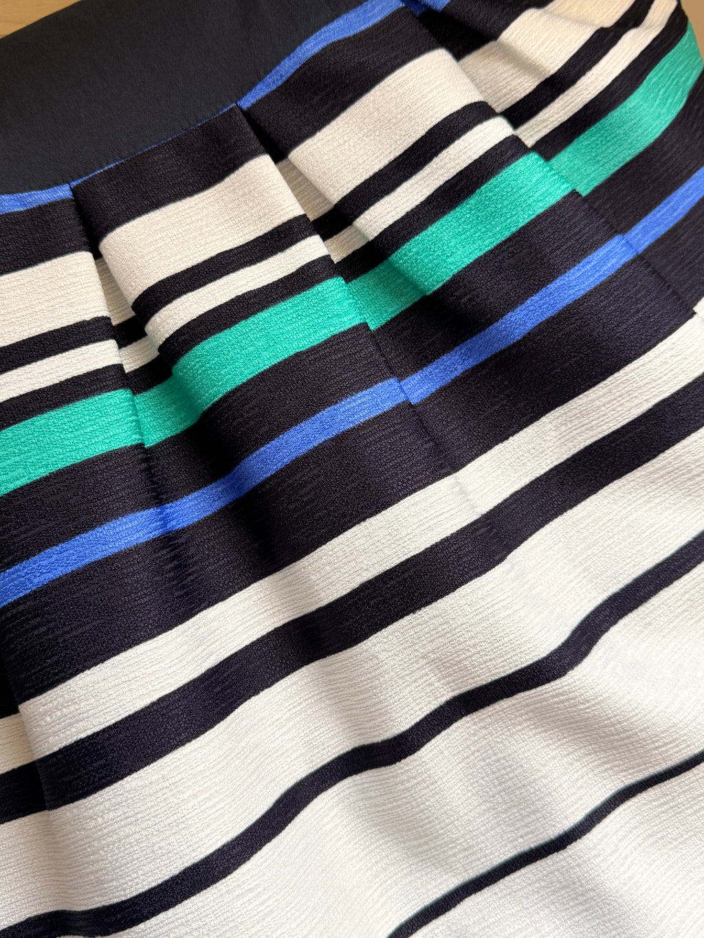 Navy Sleeveless Skater Dress with Vibrant Striped Pleated Skirt - Small
