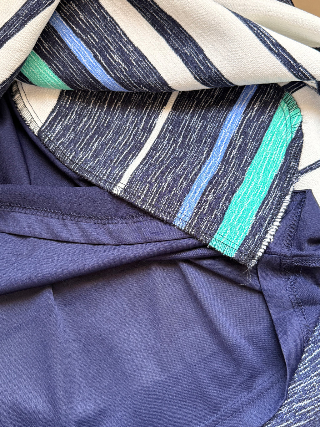 Navy Sleeveless Skater Dress with Vibrant Striped Pleated Skirt - Small
